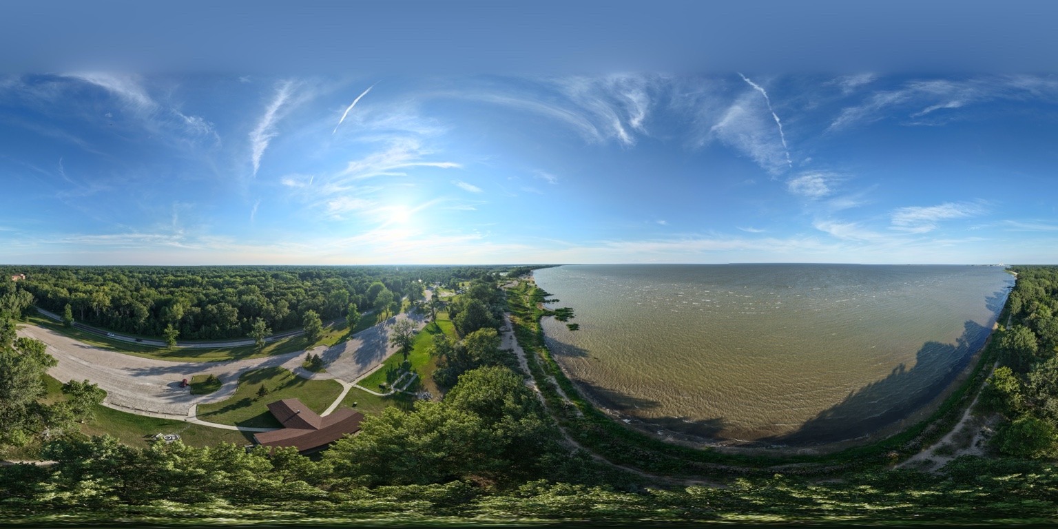 Equirectangular aerial panorama of the Saginaw Bay shoreline, parkland, and open water